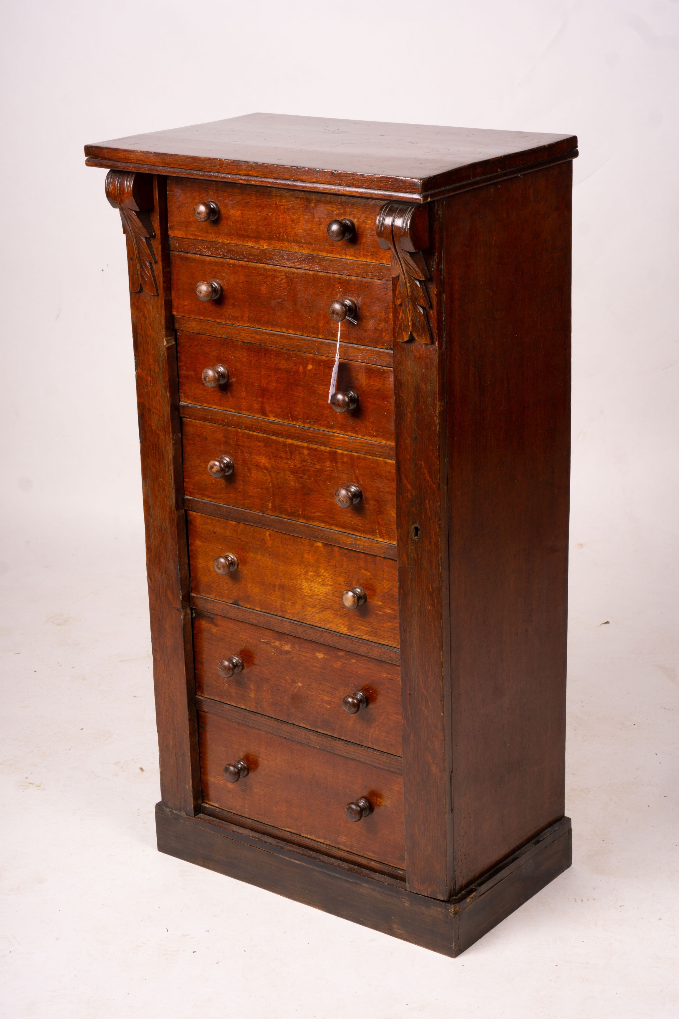 A late Victorian oak Wellington chest, width 51cm, depth 34cm, height 100cm